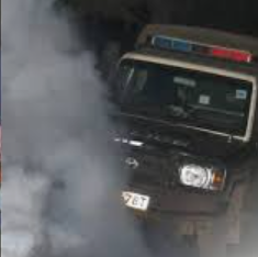 Journalists Tear-Gassed, Assaulted By Police During Chaos At Kirobon High School