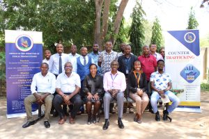 North Eastern Regional Coordinator Bonny Okemwa joins representatives from security agencies, ODPP, and partner organizations for a group photo during the regional anti-human trafficking forum held in Wajir County