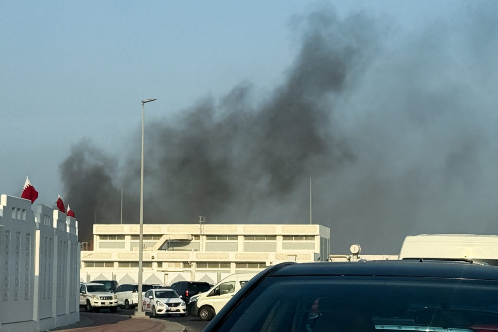 Smoke rises after several blasts were heard in Doha, Qatar, September 9, 2025. REUTERS/Ibraheem Abu Mustafa