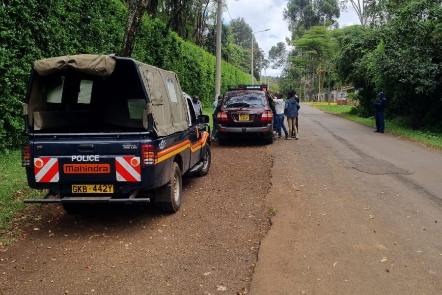Police at the scene where the car was abandoned